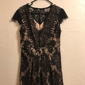 NWOT black lace lined mini dress.